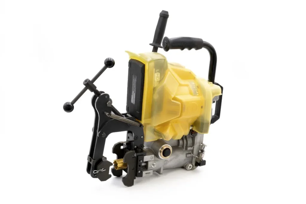 Side view of Cembre battery rail drill and clamping assembly