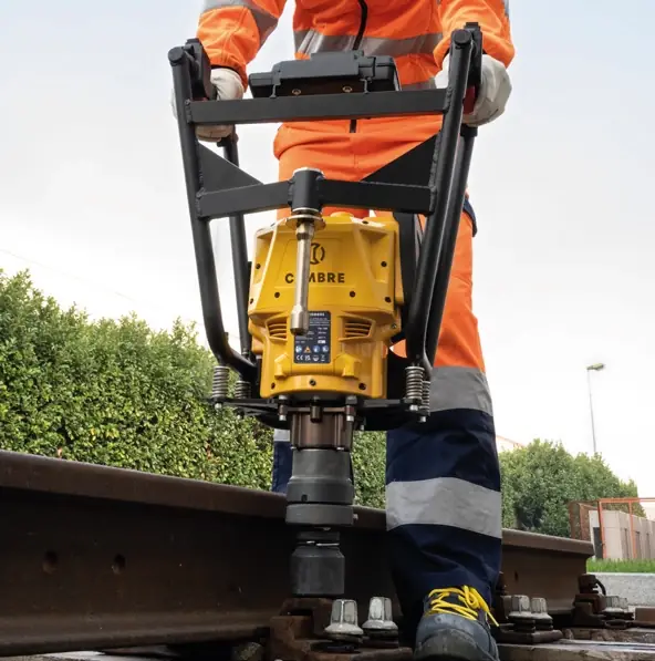 Rail drill in use on track