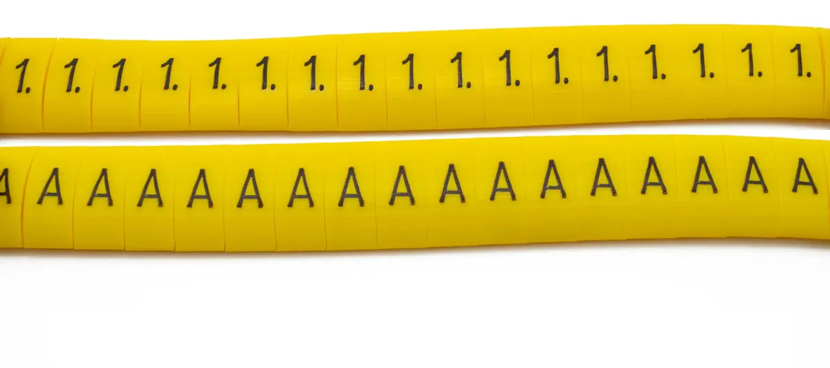 Yellow identification strips with numbers and letters