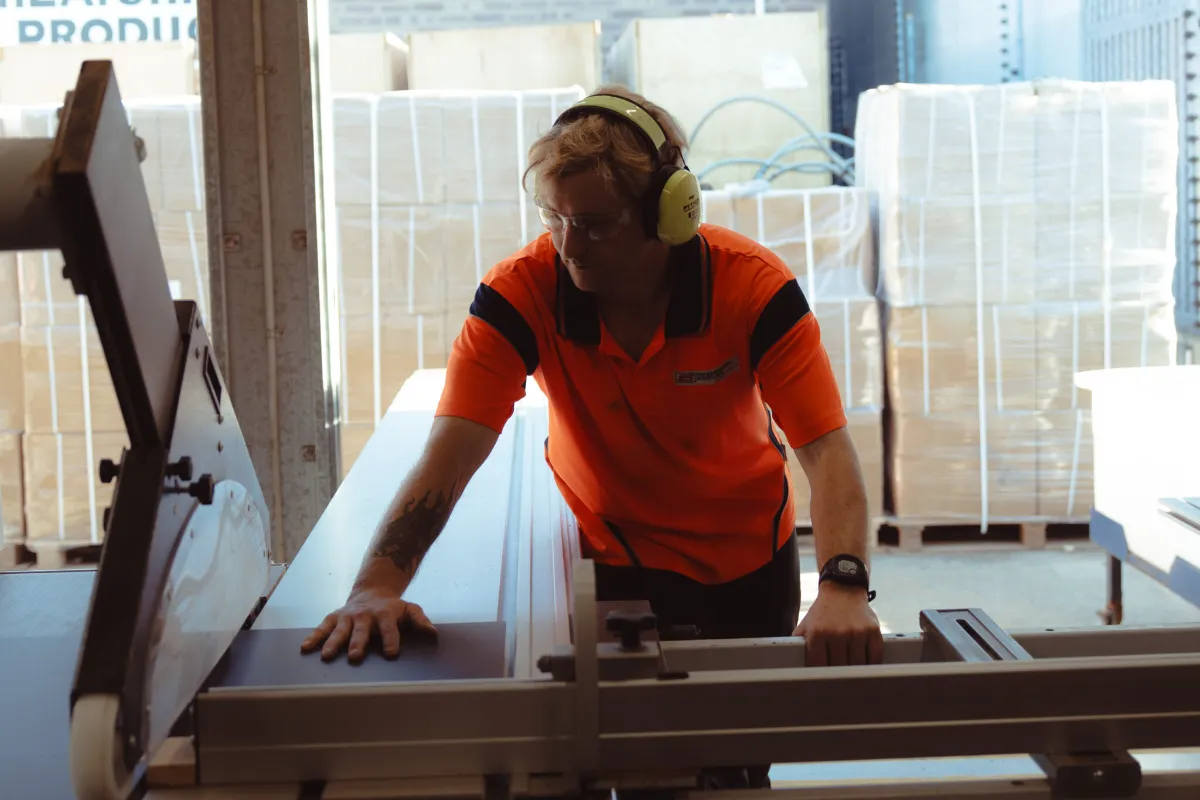Engineering Supplies storeman cutting to length in our Perth electrical supplies warehouse
