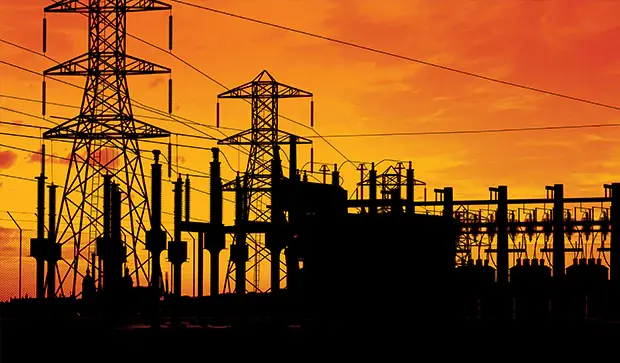 Electrical substation at sunset