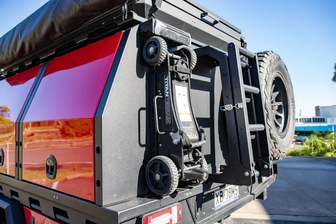 Titan Terrain jack stored on a canopy mounting bracket