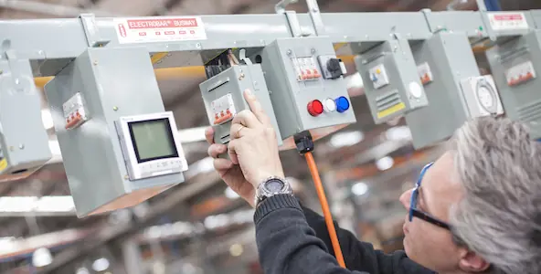 Fitting tap-off units to overhead busway