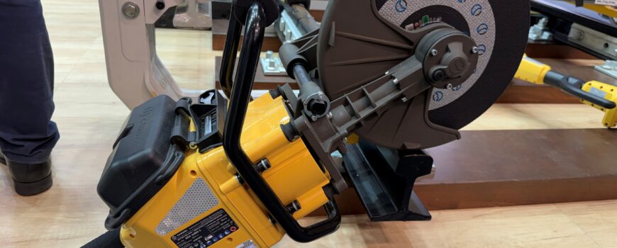 Cembre RDS-36BN-S battery rail saw on display with its cutting disc, guard and rail support arm